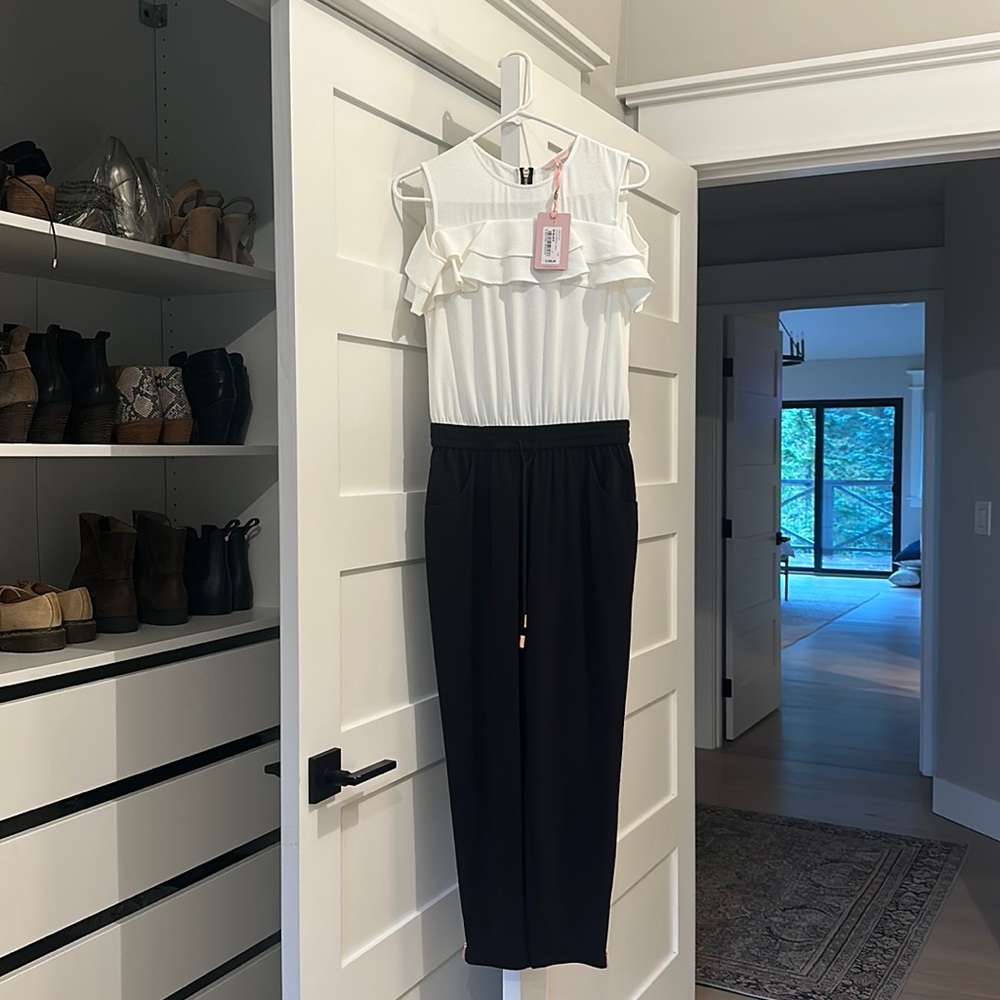 Ted Baker one piece jumpsuit with gold zipper detail .